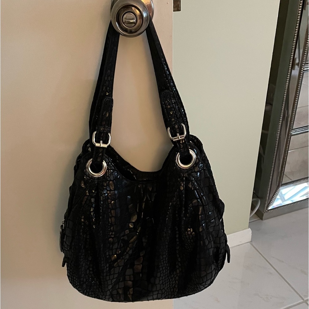 Firm-light as a feather- great very roomy black hobo bag- final firm